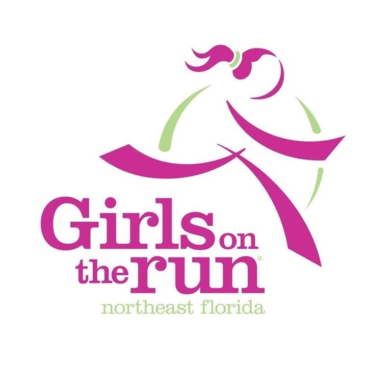 The Girls on the Run logo, featuring a pink silhouette of a running girl with a green path underneath