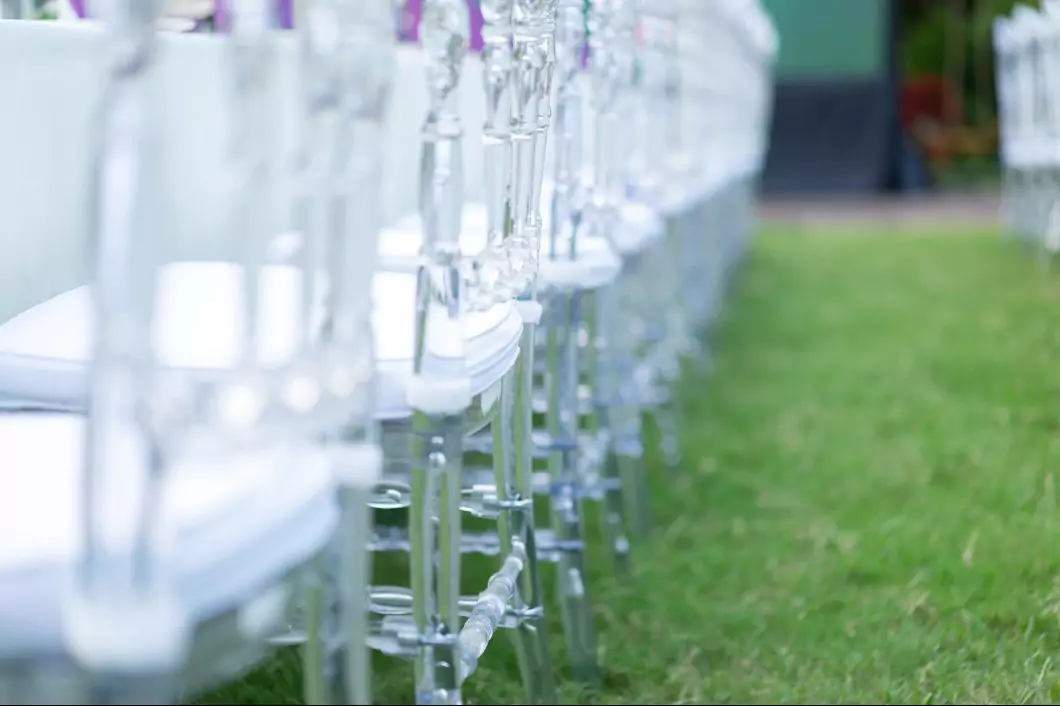 Row of clear ghost chairs