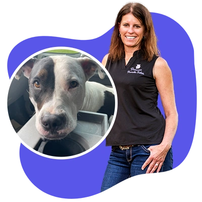 Princess Darla, owner of Princess Portable Toilets, with her loyal pit bull, Petey