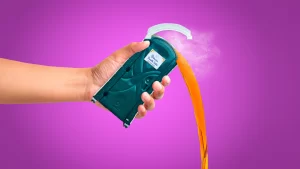 Giant hand holding a princess portable toilet as it empties waste in a dramatic scene