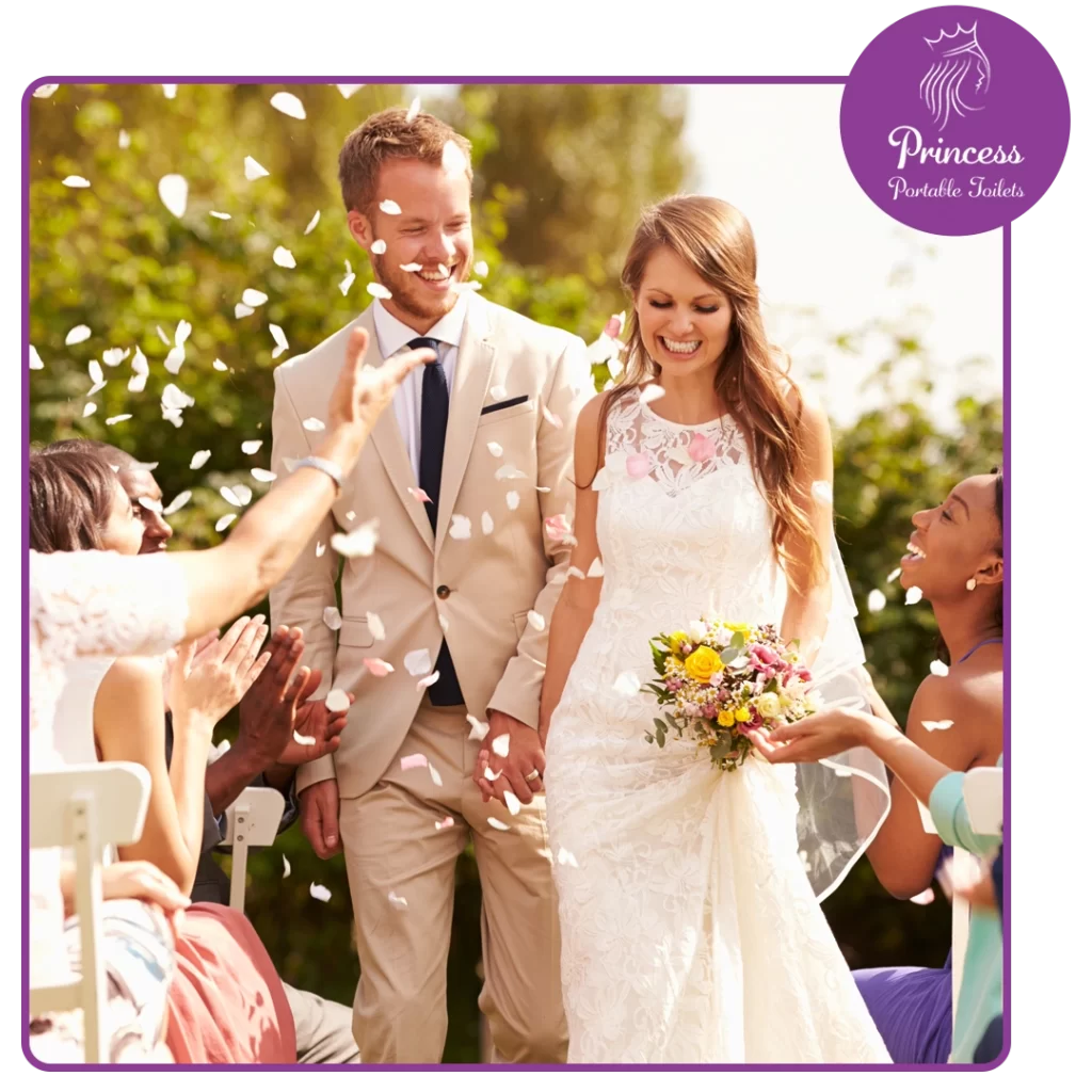 Couple at a wedding event using portable toilet rentals in North Central Florida