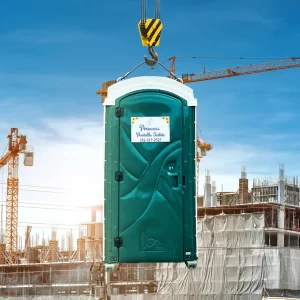 Princess Portable Toilet lifted by a crane hook, showcasing innovative flyable restroom solutions for hard-to-reach locations