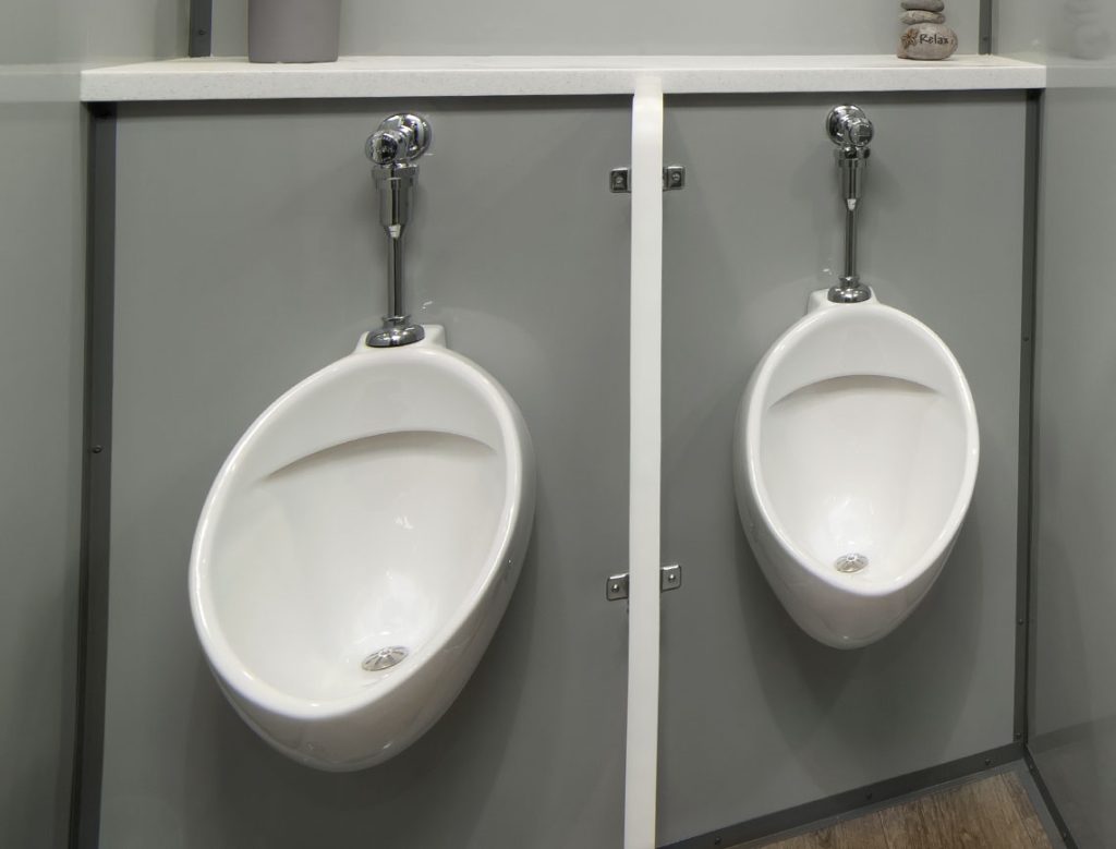Urinal inside a Princess Luxury Restroom Trailer