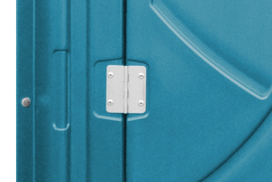Close-up of the durable door hinges on a Princess Portable Toilet unit